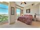 Bright bedroom with a king-size bed and city views at 9103 Alta Dr # 701, Las Vegas, NV 89145