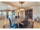 Elegant dining room with granite top table and ornate doors at 9103 Alta Dr # 701, Las Vegas, NV 89145