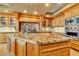 Luxury kitchen with granite countertops and stainless steel appliances at 9103 Alta Dr # 701, Las Vegas, NV 89145