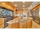 Modern kitchen with granite island and high end stainless steel appliances at 9103 Alta Dr # 701, Las Vegas, NV 89145