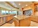 Spacious kitchen with granite island, stainless steel appliances, and custom cabinetry at 9103 Alta Dr # 701, Las Vegas, NV 89145
