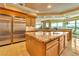 Island kitchen features granite countertops and stainless steel appliances at 9103 Alta Dr # 701, Las Vegas, NV 89145