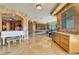 Open living area with wet bar and white piano at 9103 Alta Dr # 701, Las Vegas, NV 89145