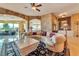 Upscale living room with curved sofa and city views at 9103 Alta Dr # 701, Las Vegas, NV 89145