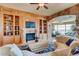 Elegant living room with built-in shelving and fireplace at 9103 Alta Dr # 701, Las Vegas, NV 89145