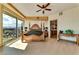 Luxurious main bedroom with king-size bed and access to balcony at 9103 Alta Dr # 701, Las Vegas, NV 89145