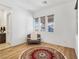 Bright bedroom with comfy chair and patterned rug at 144 Juliette Pointe Ln, Henderson, NV 89011