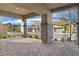 Covered patio with brick pavers and mountain views at 144 Juliette Pointe Ln, Henderson, NV 89011