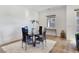 Elegant dining area with a round glass table and four chairs at 144 Juliette Pointe Ln, Henderson, NV 89011