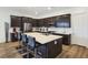 Modern kitchen with island, stainless steel appliances, and quartz countertops at 144 Juliette Pointe Ln, Henderson, NV 89011