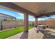 Covered patio with seating area and view of the mountains at 144 Juliette Pointe Ln, Henderson, NV 89011