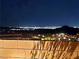 Night time view of city lights from backyard at 144 Juliette Pointe Ln, Henderson, NV 89011