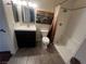 Bathroom with shower/tub, vanity, and tiled floors at 2120 Ramrod Ave # 415, Henderson, NV 89014