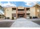 Two-story building with stairs and landscaping at 2120 Ramrod Ave # 415, Henderson, NV 89014