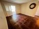 Living room with tile floors and sliding glass doors to patio at 2120 Ramrod Ave # 415, Henderson, NV 89014