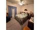 Bright bedroom with a comfortable queen-size bed and ceiling fan at 3020 Ripon Dr, Las Vegas, NV 89134