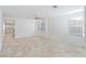 Spacious living room with tile flooring and ceiling fan at 5372 Polo Grounds St, Las Vegas, NV 89148