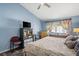 Serene bedroom with a king-size bed and plenty of natural light at 5683 Whale Watch St, Las Vegas, NV 89113