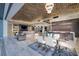 Open-plan dining area and living area featuring luxurious modern decor at 673 Falcon Cliff Ct, Henderson, NV 89012