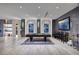Well-lit game room with a pool table, comfortable seating, and modern decor at 673 Falcon Cliff Ct, Henderson, NV 89012