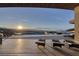 Stunning infinity pool overlooking the city with lounge chairs and scenic mountain views at 673 Falcon Cliff Ct, Henderson, NV 89012
