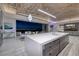 Modern kitchen with island and gourmet appliances, plus an outdoor view at 673 Falcon Cliff Ct, Henderson, NV 89012