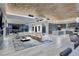Expansive living room with an open concept floorplan and modern finishes at 673 Falcon Cliff Ct, Henderson, NV 89012