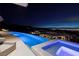 Enjoy the amazing Las Vegas skyline from this home's infinity pool and spa at 673 Falcon Cliff Ct, Henderson, NV 89012