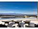 Enjoy the poolside lounge chairs while taking in expansive mountain views at 673 Falcon Cliff Ct, Henderson, NV 89012