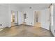 Empty bedroom with tile flooring, and views of the closet, bathroom, and laundry areas at 7701 Himalayas Ave # 104, Las Vegas, NV 89128