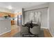 Dining area includes a round table, four chairs, and views of the adjacent kitchen at 7701 Himalayas Ave # 104, Las Vegas, NV 89128