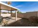 Inviting covered patio area, perfect for outdoor entertaining and relaxation with a BBQ grill at 7936 Dexter Falls St, Las Vegas, NV 89149