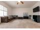 Comfortable bedroom area featuring carpet and a ceiling fan at 7936 Dexter Falls St, Las Vegas, NV 89149