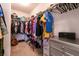 Walk-in closet with ample storage and closet organizer at 7936 Dexter Falls St, Las Vegas, NV 89149