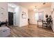 Welcoming entryway with modern light fixture and durable laminate flooring at 7936 Dexter Falls St, Las Vegas, NV 89149