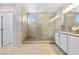 Bathroom with walk-in shower and double vanity at 23 Papavero Ct, Henderson, NV 89011