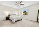 Bright bedroom with mountain views and ceiling fan at 23 Papavero Ct, Henderson, NV 89011