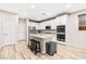 Clean, modern kitchen with white cabinets and an island at 23 Papavero Ct, Henderson, NV 89011