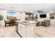 Modern kitchen island and stainless steel appliances at 23 Papavero Ct, Henderson, NV 89011