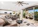 Spacious living room featuring sliding doors to a patio at 23 Papavero Ct, Henderson, NV 89011