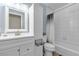 Stylish bathroom featuring a white vanity, tiled shower, and modern fixtures at 260 E Desert Rose Dr, Henderson, NV 89015