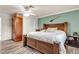 Bedroom featuring a wooden bed frame, neutral walls, and a ceiling fan at 260 E Desert Rose Dr, Henderson, NV 89015