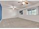 Bright bedroom with dual ceiling fans, recessed lighting, and large windows offering natural light at 260 E Desert Rose Dr, Henderson, NV 89015