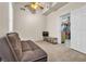 Bonus room featuring neutral carpet, open closet, and a door leading to the garage at 260 E Desert Rose Dr, Henderson, NV 89015