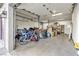 Spacious garage featuring a concrete floor and ample storage space for vehicles and tools at 260 E Desert Rose Dr, Henderson, NV 89015