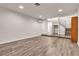 Spacious living area with modern flooring and recessed lighting, leading to a staircase at 260 E Desert Rose Dr, Henderson, NV 89015