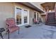 Outdoor patio area with seating and a staircase leading to an upper level at 260 E Desert Rose Dr, Henderson, NV 89015