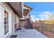 Outdoor patio with seating area and staircase leading to the upper floor at 260 E Desert Rose Dr, Henderson, NV 89015