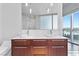 Elegant bathroom with dual sinks, marble vanity, and city views at 4471 Dean Martin Dr # 801, Las Vegas, NV 89103