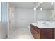 Spa-like bathroom with marble flooring, dual sinks, and large mirror at 4471 Dean Martin Dr # 801, Las Vegas, NV 89103